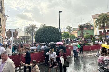 La lluvia obligó a anticipar el final del Domingo de Ramos en Alcalá. Galería de fotos
